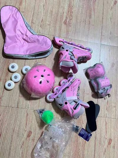 转让轮滑鞋，9成新，鞋码35-38可调
